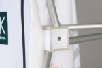 Close-up of hook-and-loop fabric graphic attached to the aluminum pop-up display frame