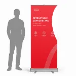 Economy retractable banner stand with Graphic Stands print beside an adult silhouette
